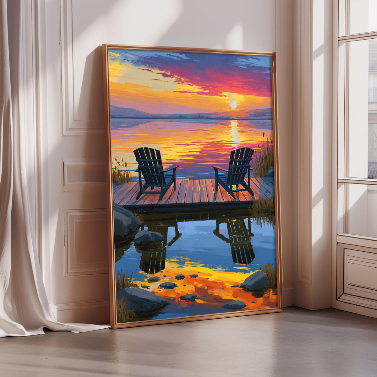 A framed painting depicting a serene lakeside scene with a wooden dock and two black Adirondack chairs overlooking the water, set against a vibrant sunset sky.