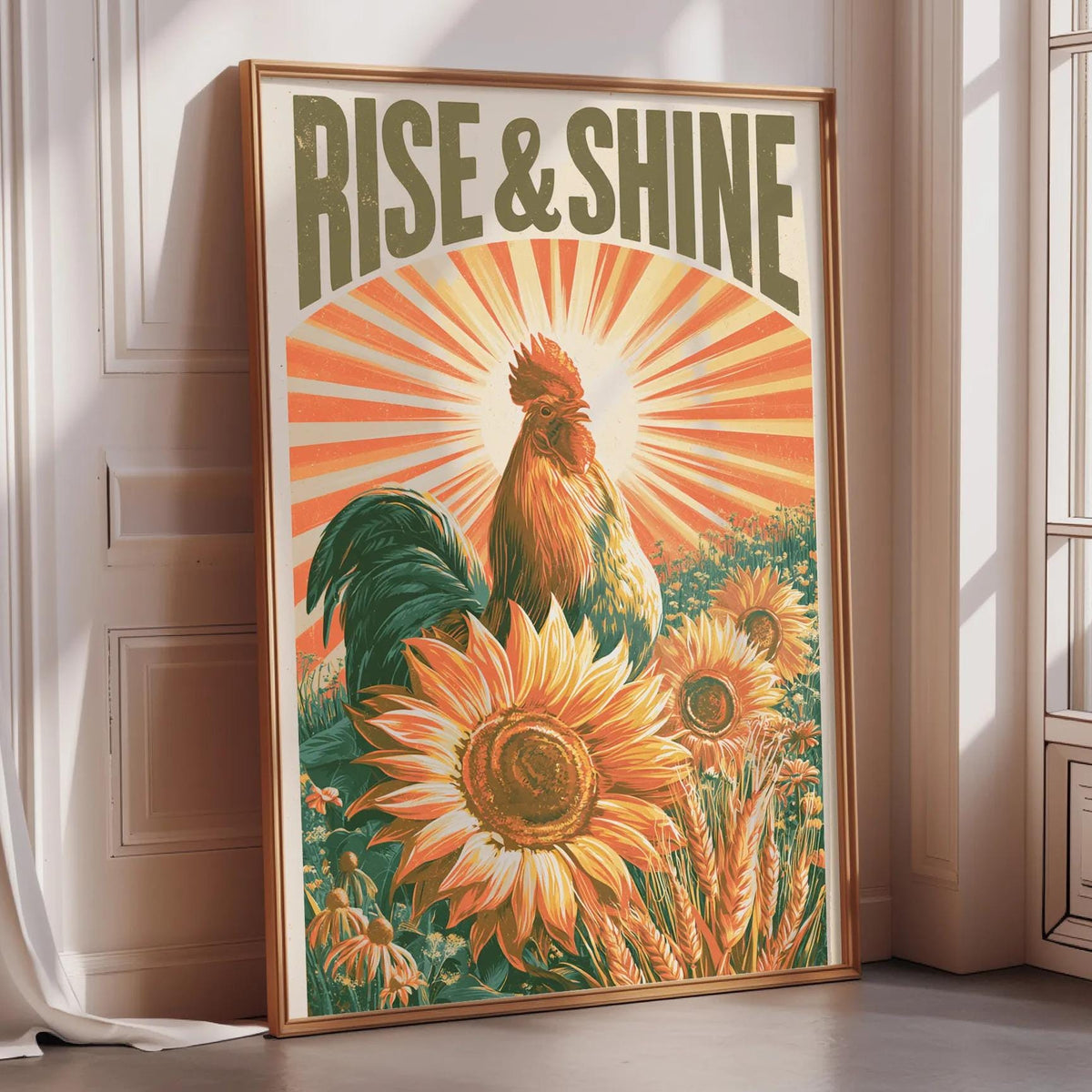A framed poster with a rooster and sunflowers, featuring the text "RISE & SHINE" prominently displayed.