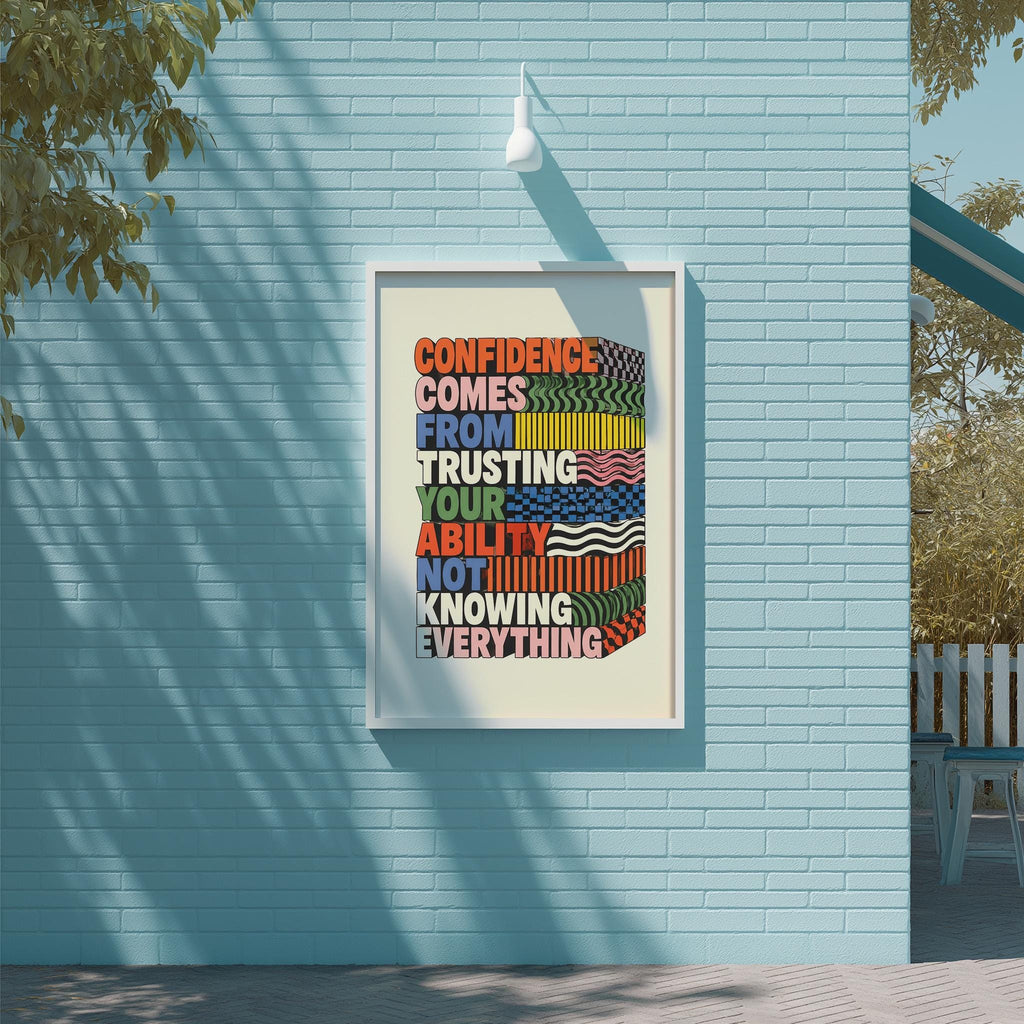 a poster with a motivational message displayed on a blue brick wall.