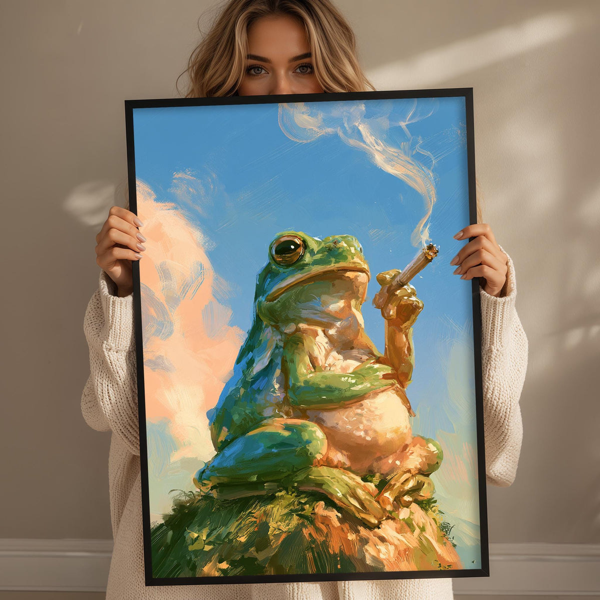 A woman holds up a framed painting depicting a green frog sitting on a rock and smoking a cigarette.