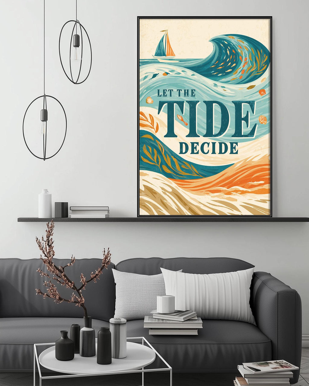 a large framed poster with a colorful illustration of a sailboat on a wave, hanging on a wall above a gray couch with a coffee table in front of it.