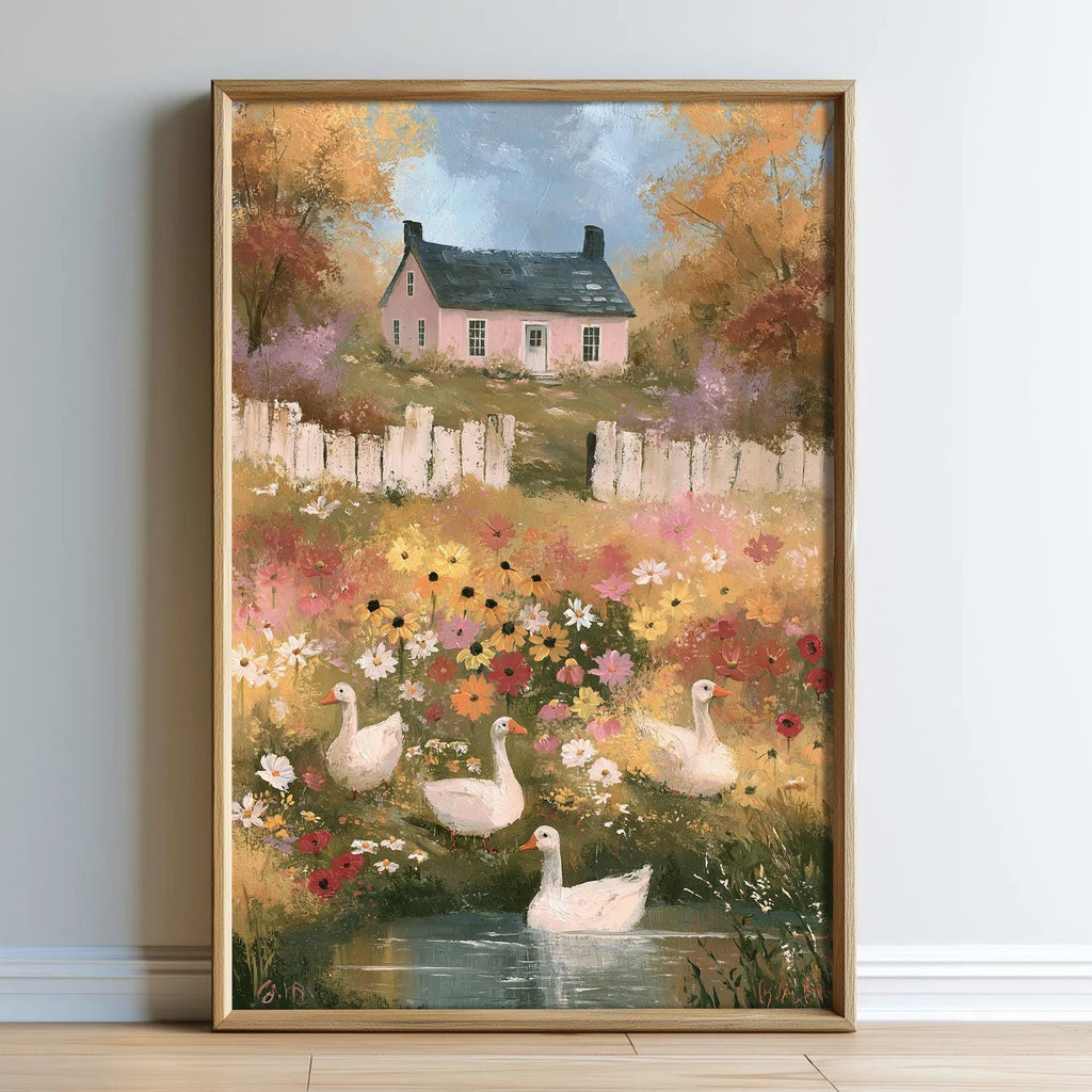 A framed painting depicting a serene garden scene with a pink house, white geese, and a pond surrounded by colorful flowers.