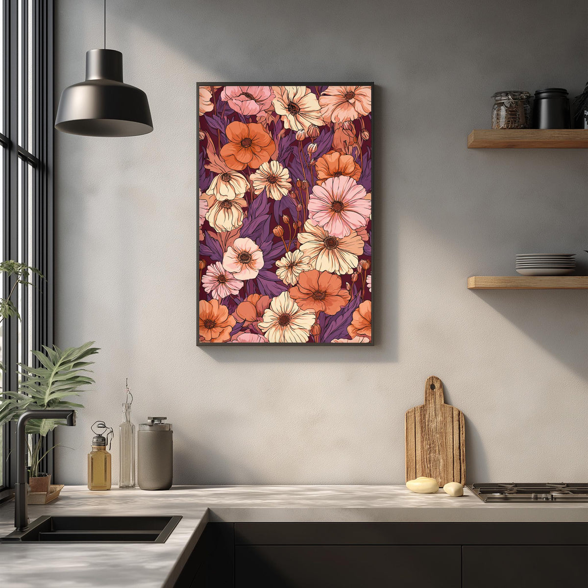 a kitchen counter with a wooden cutting board, a plant, and various kitchen items such as a bottle and a jar. Above the counter, there is a framed picture of a floral pattern in shades of orange, pink, and purple.