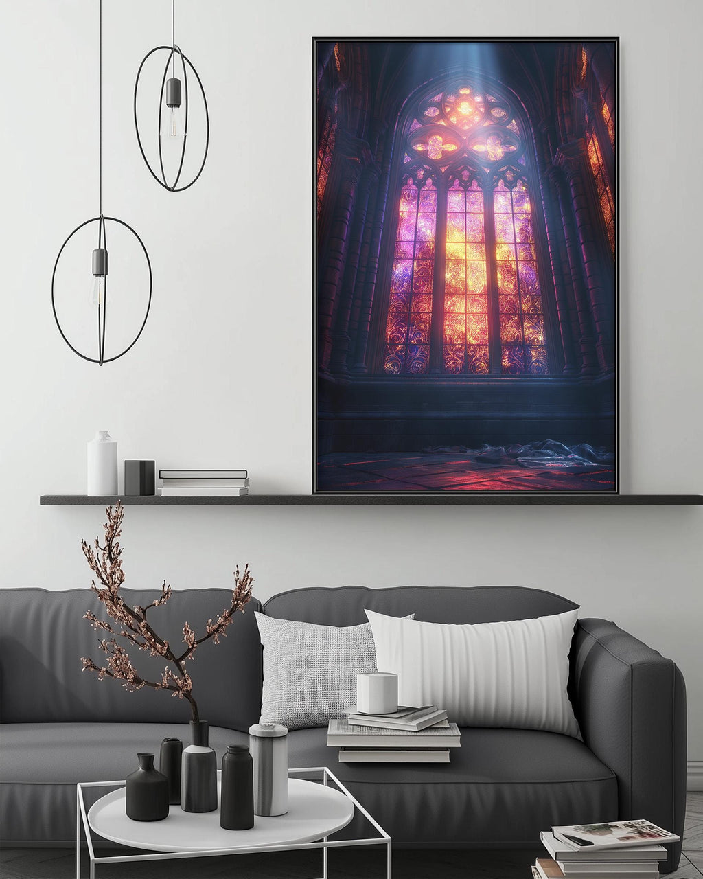 a large, colorful painting of a stained glass window in a cathedral, hanging on a wall above a gray couch with a coffee table in front of it.