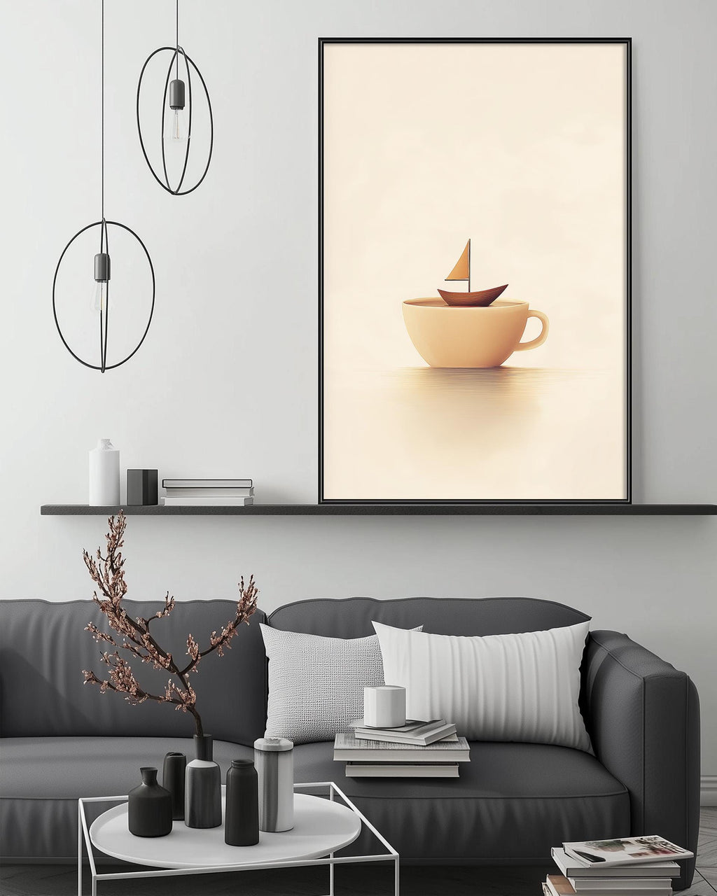 a modern living room with a gray sofa, a coffee table, and a large framed artwork depicting a small boat on a cup.