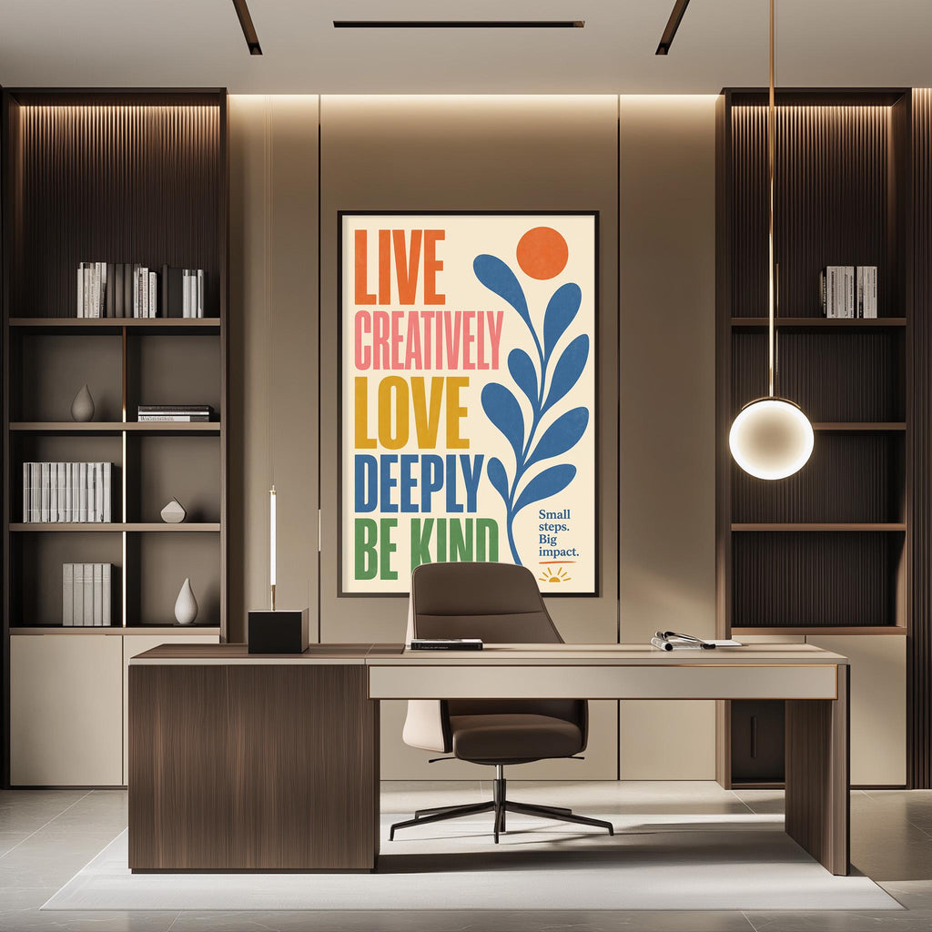 a modern office space with a large poster on the wall that reads "LIVE CREATIVELY LOVE DEPTHY BE KIND" in a vibrant, colorful design. The office has a wooden desk, a comfortable-looking chair, and a bookshelf filled with books. The overall design and layout of the space suggest a well-organized and functional workspace.