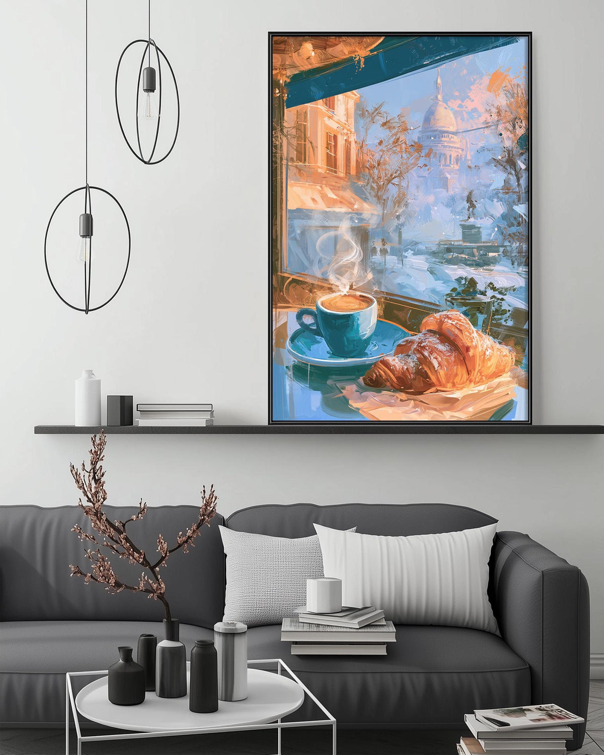 a cozy living room with a gray sofa, a coffee table, and a large framed painting depicting a breakfast scene with a cup of coffee, croissants, and a vase of flowers.