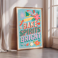 a colorful poster with the text "BAKE SPIRITS BRIGHT" and various decorative elements such as flowers, stars, and a ribbon.