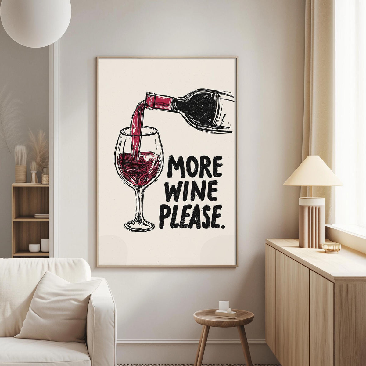 a living room with a large framed poster on the wall that says "MORE WINE PLEASE".