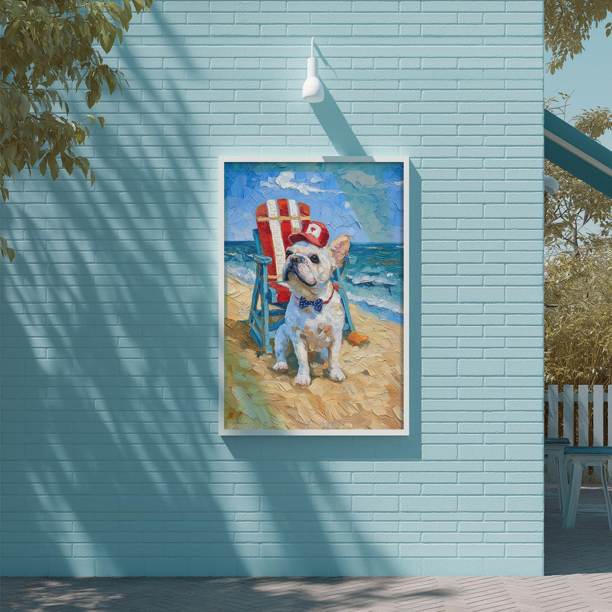 A framed painting of a dog sitting in a beach chair on a sandy beach, with the ocean in the background.