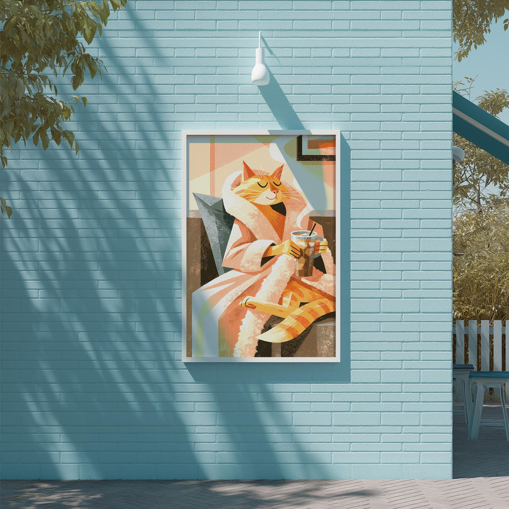 A framed illustration of a cat wearing a robe and holding a cup of tea is displayed on a blue wall.