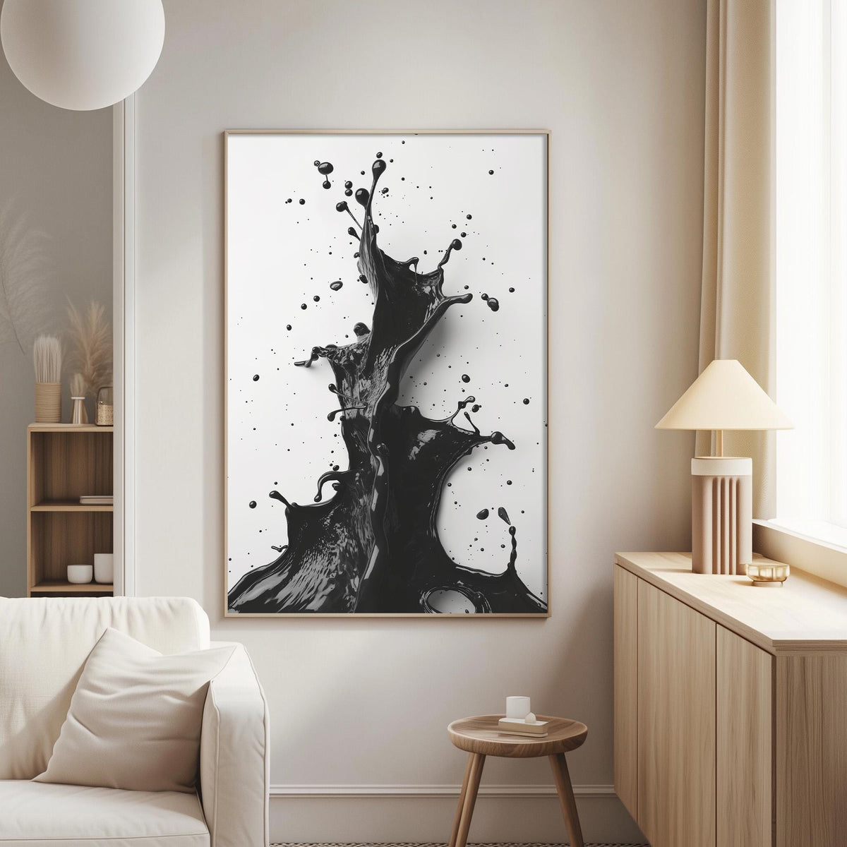 a large black and white abstract painting hanging on a wall in a living room.