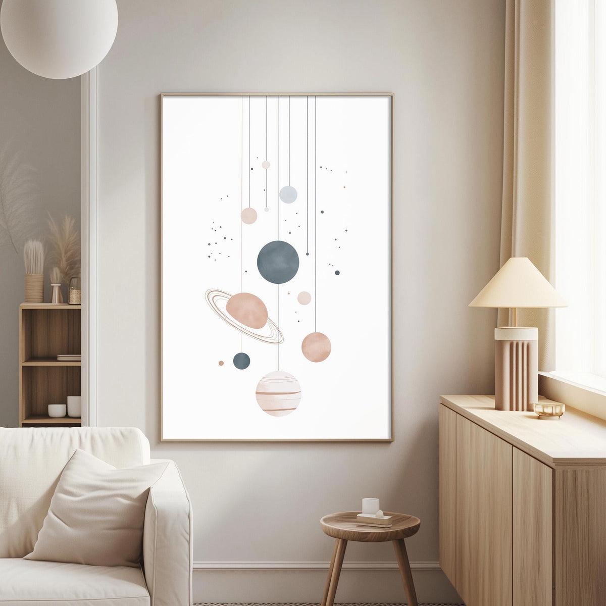 a living room with a white sofa, a wooden side table, and a framed artwork featuring a space-themed design with planets and stars hanging from the wall.