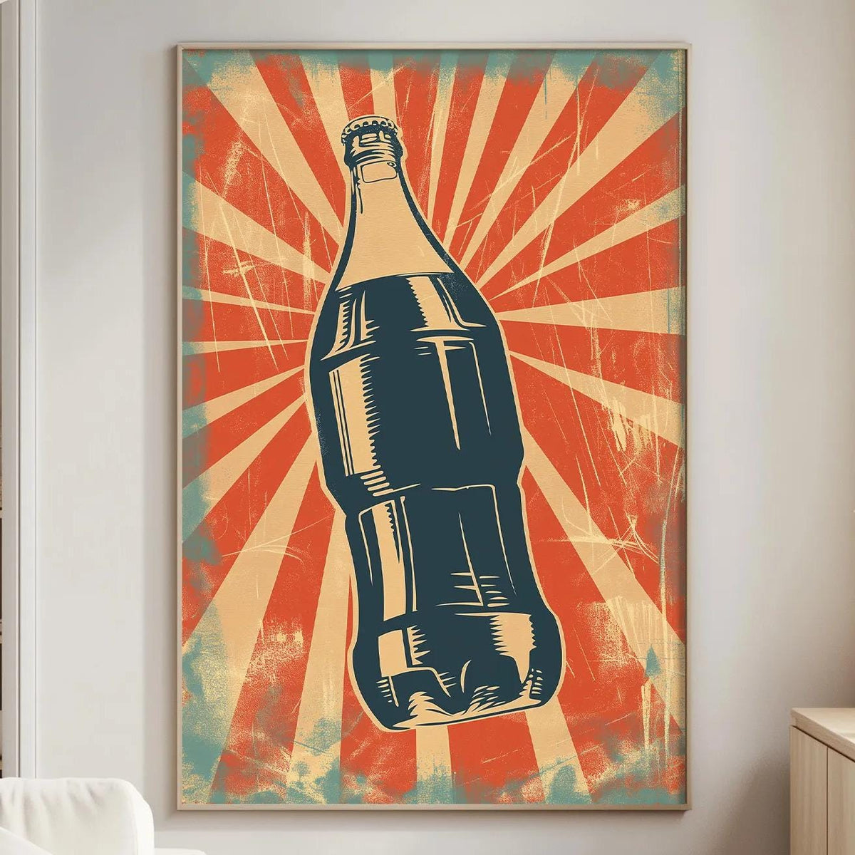 a large framed poster of a soda bottle on a wall in a living room.
