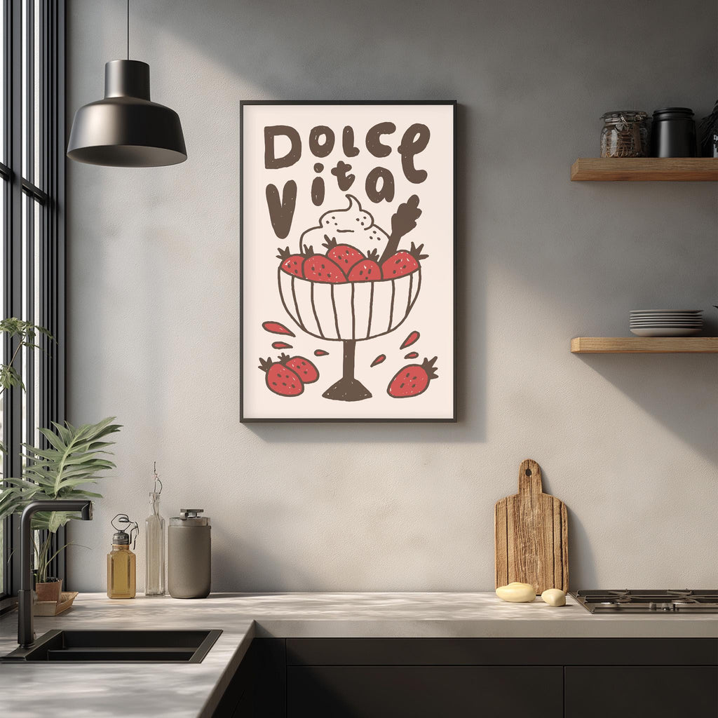 a kitchen counter with various kitchen items, including a framed poster with a strawberry design, a cutting board, and a potted plant.