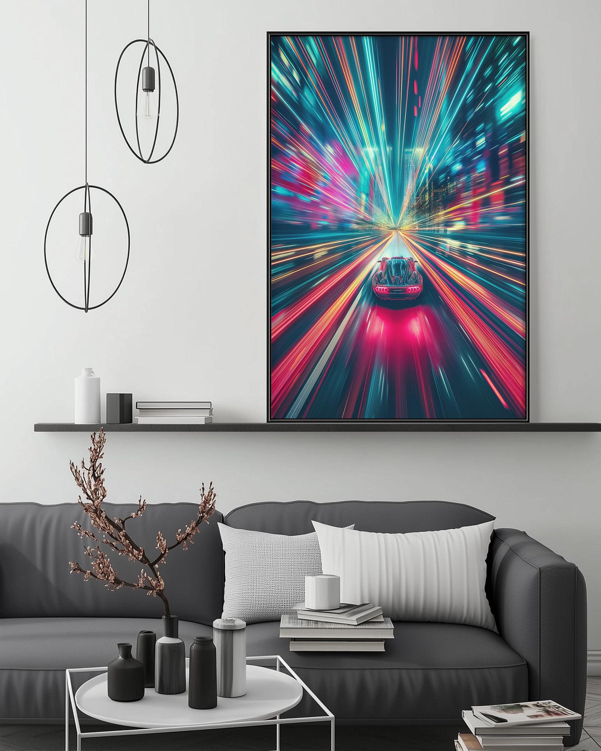 a modern living room with a gray sofa, a coffee table, and a large abstract painting depicting a car in motion with colorful, blurred lights.