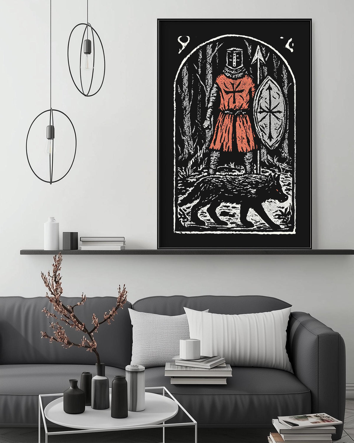 a living room with a gray sofa, a coffee table, and a large framed artwork depicting a knight in orange armor standing next to a wolf.
