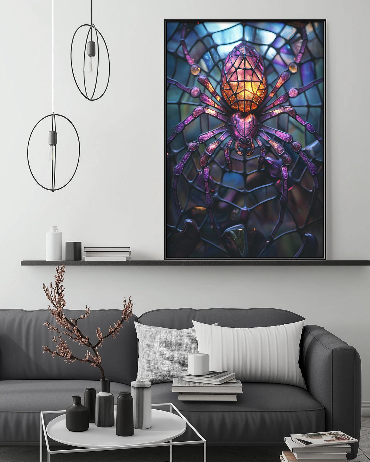 a large, colorful painting of a spider on a web hanging on a wall above a gray couch in a living room setting.
