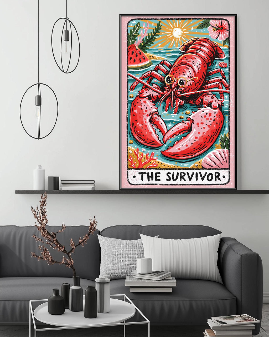 a large framed artwork depicting a red lobster, with the text "The Survivor" below it. The artwork is displayed on a wall above a gray couch in a living room setting.