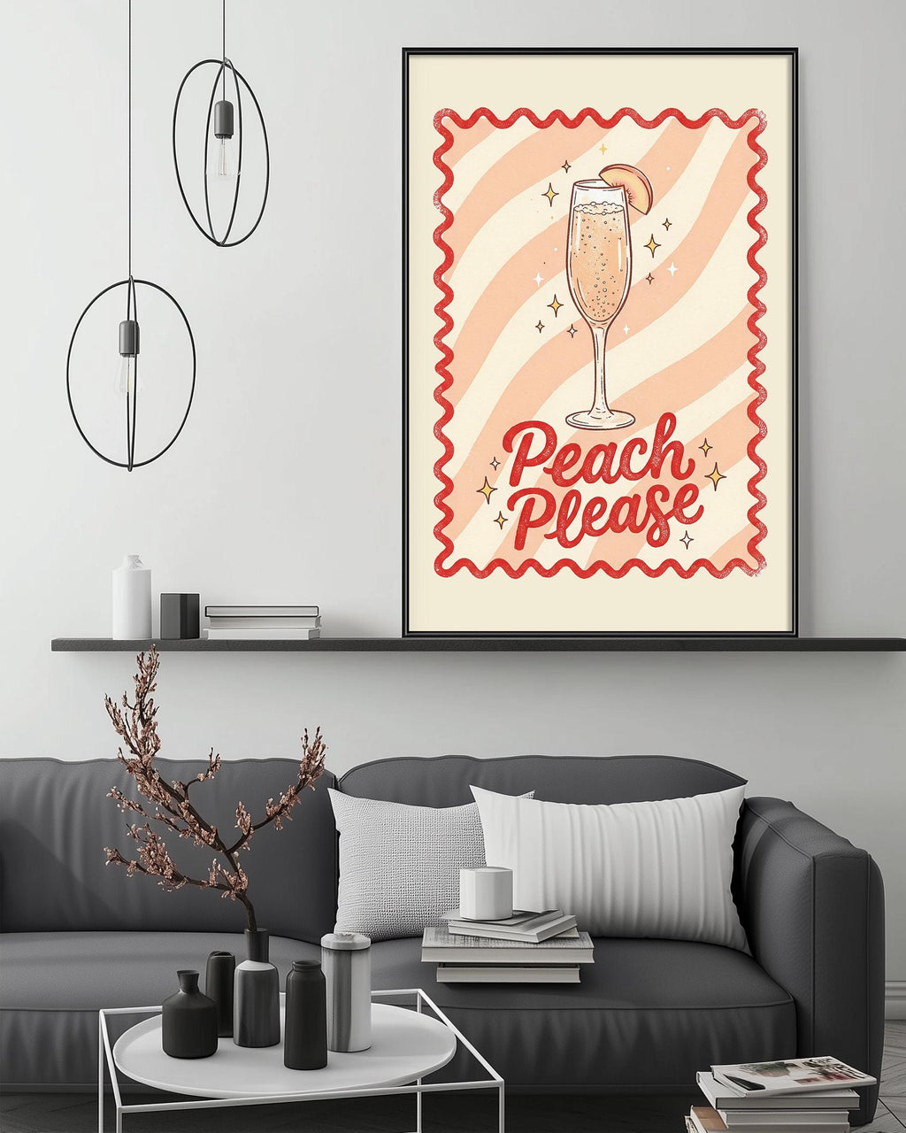 a living room with a gray couch, a coffee table, and a framed poster with a peach and champagne illustration. The poster has the text "Peach Please" written on it.