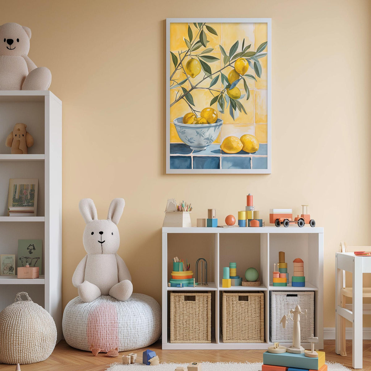 A cozy children's room with a white bookshelf, a plush rabbit, and a colorful toy box filled with various toys. A framed painting of lemons and a bowl of fruit is displayed on the wall above the bookshelf.