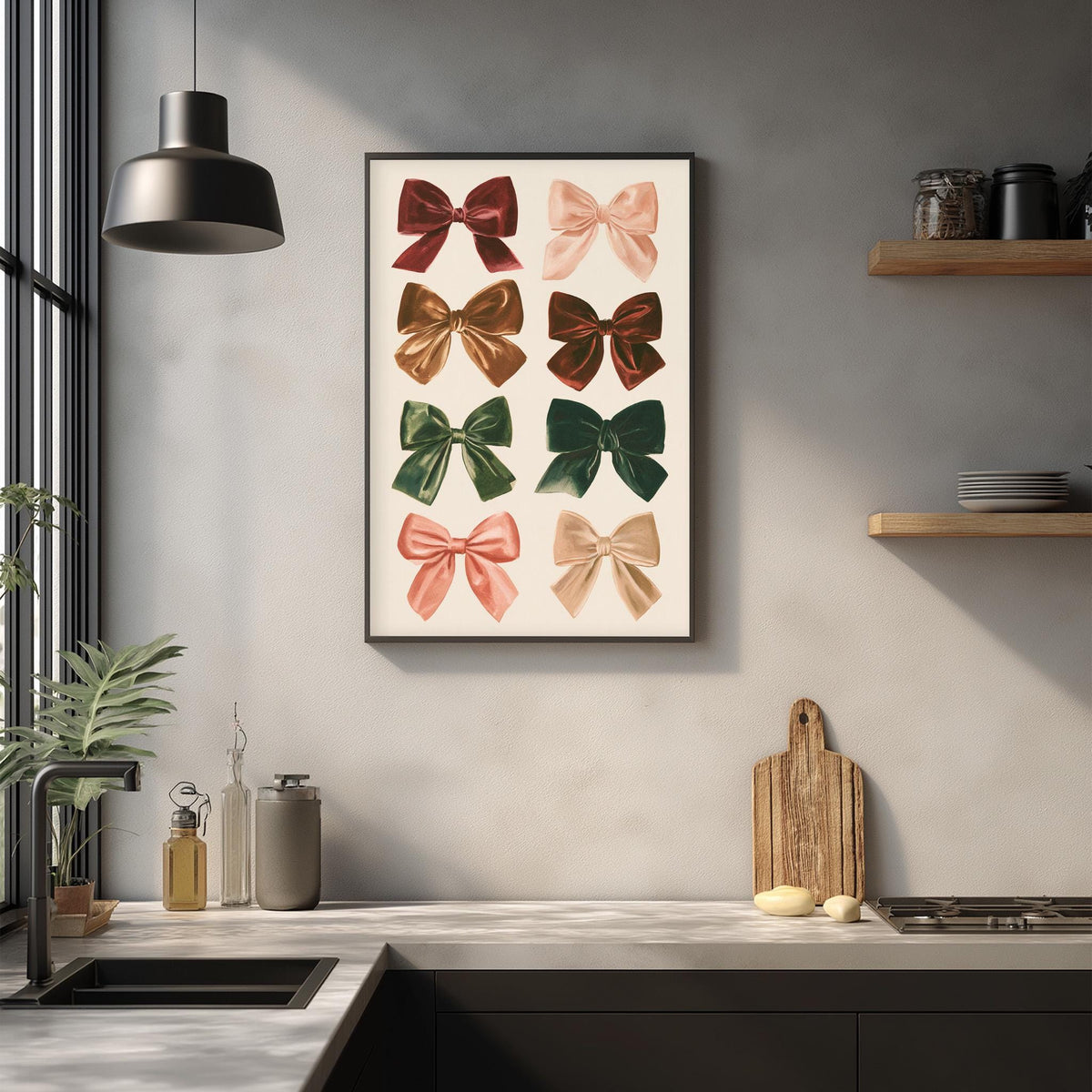 a kitchen counter with a framed poster of colorful bows hanging above it. The poster displays a variety of bows in different colors and sizes, creating a visually appealing and decorative element in the kitchen.