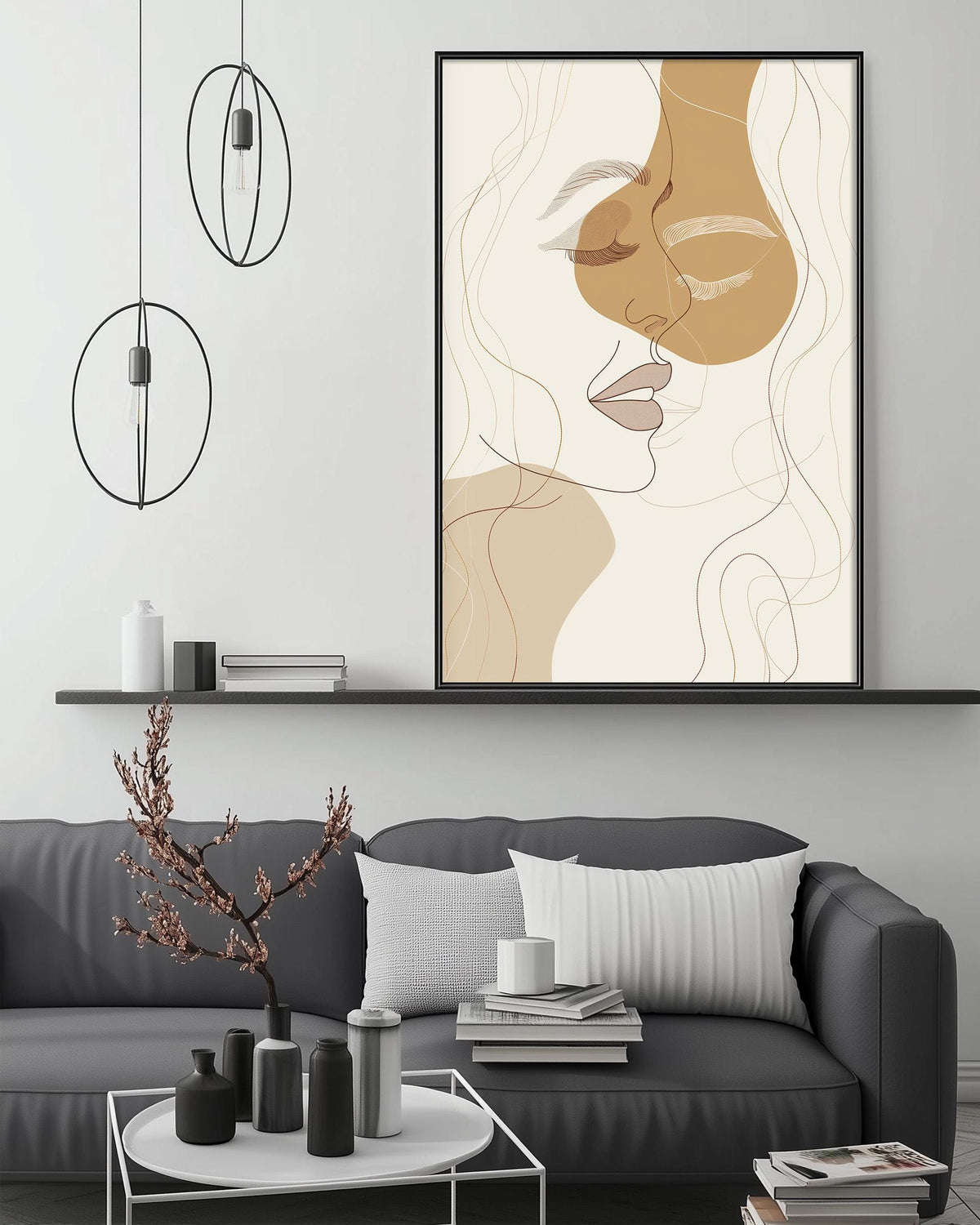 a modern living room with a gray sofa, a coffee table, and a large abstract portrait hanging on the wall above the sofa.