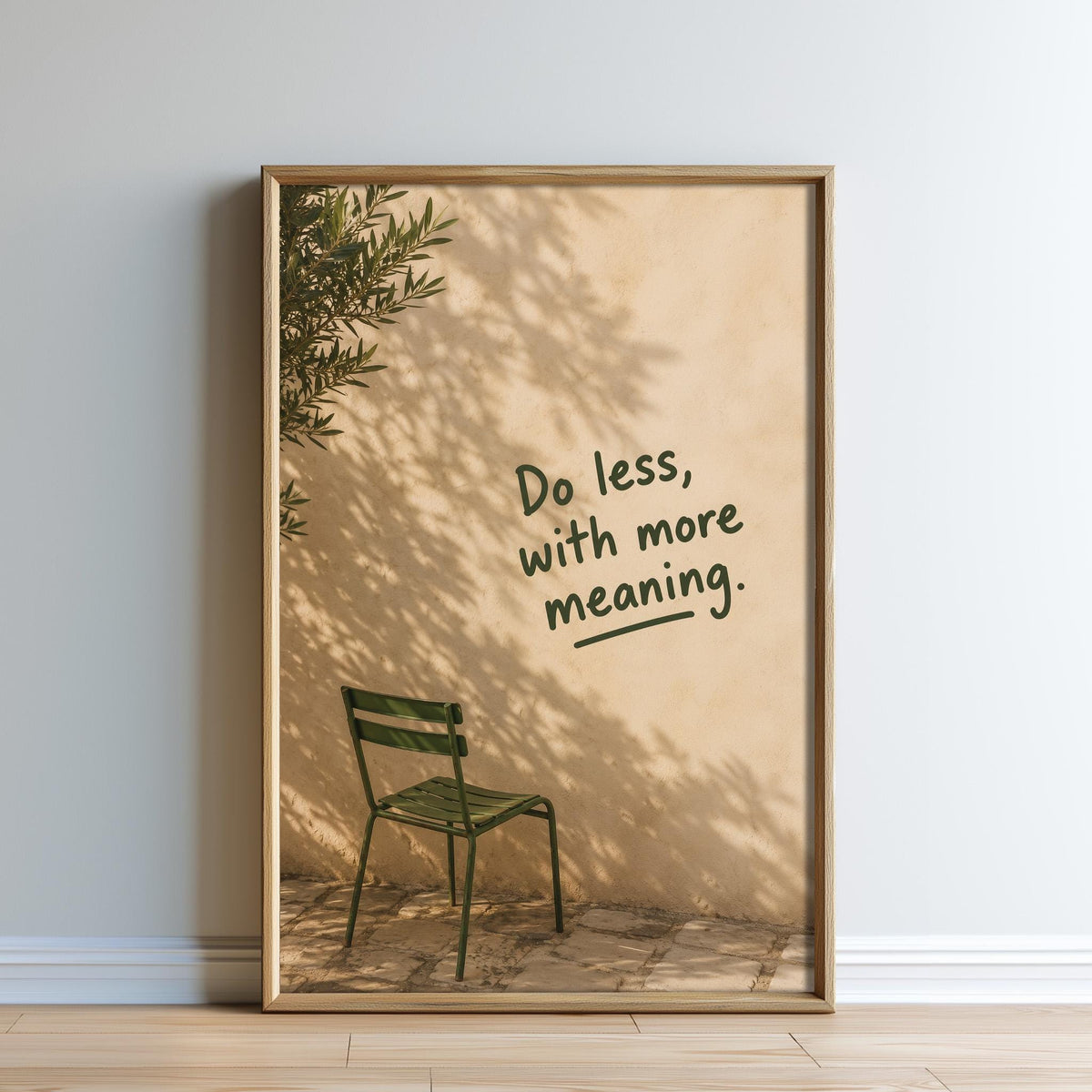 a green chair against a wall with the text "Do less, with more meaning."
