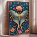 A framed artwork depicting a colorful butterfly with intricate floral designs and a crescent moon in the background, placed on a white wall near a window.