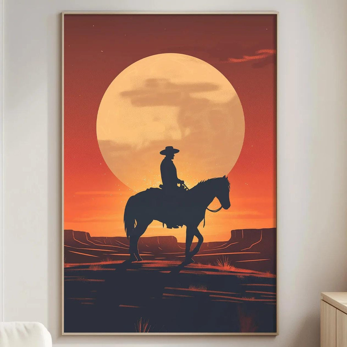 a cowboy riding a horse in a desert landscape at sunset.