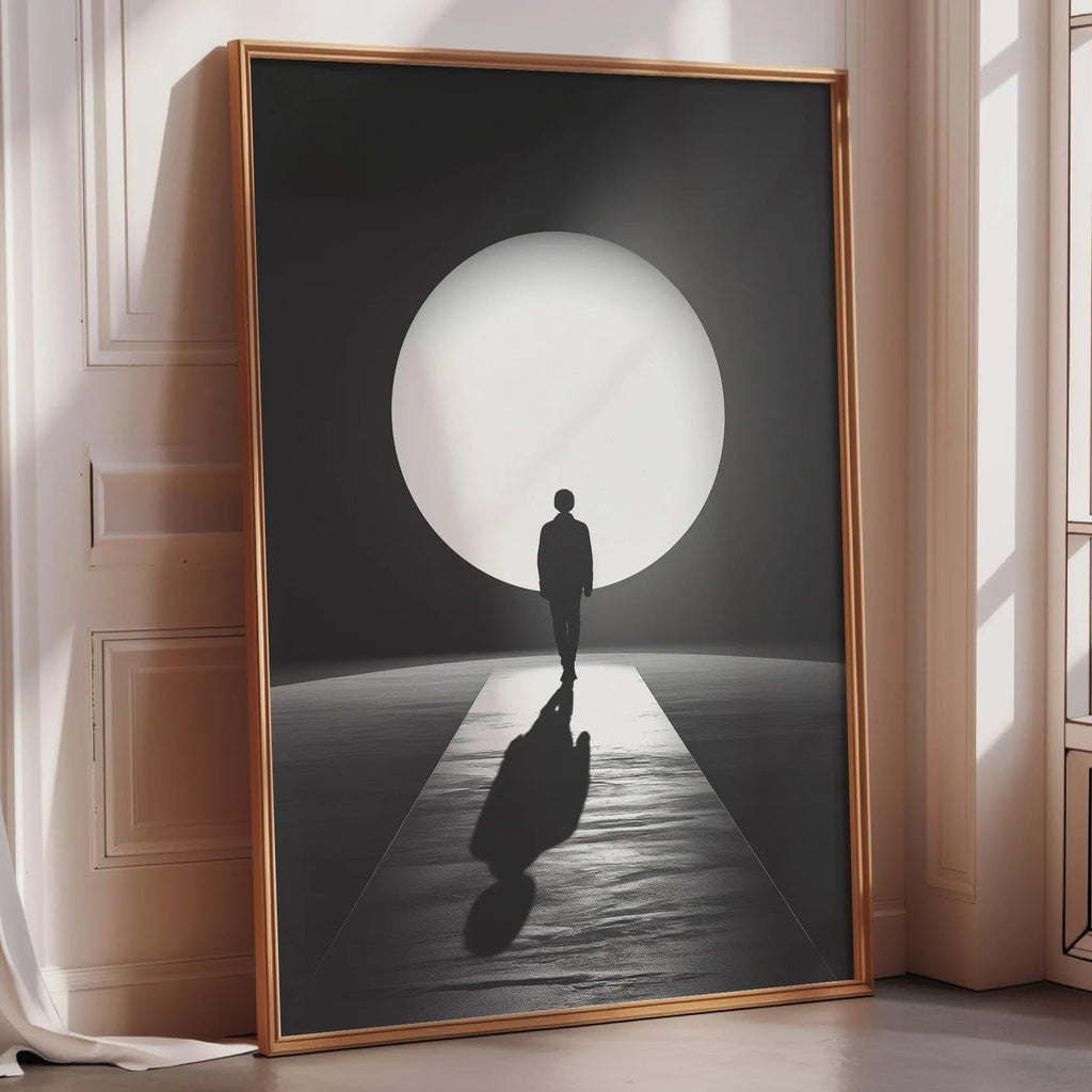 a large black and white photograph of a person standing in front of a large circular light source, creating a dramatic and contemplative scene.