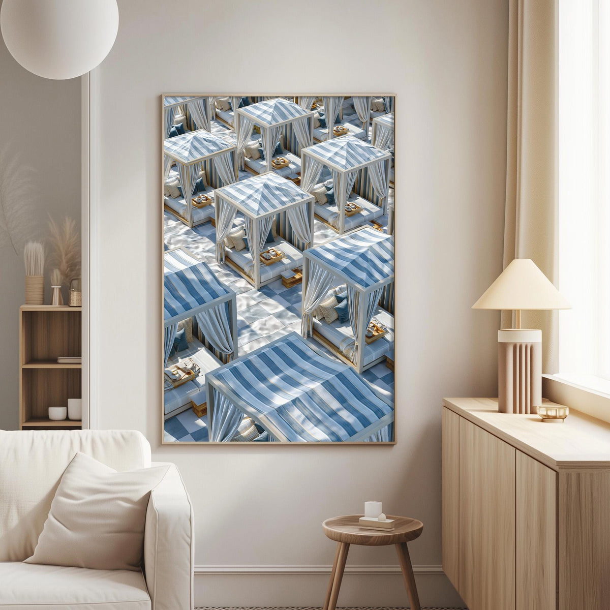 a large framed print of a beach scene with multiple blue and white striped umbrellas arranged in a grid-like pattern on the wall.