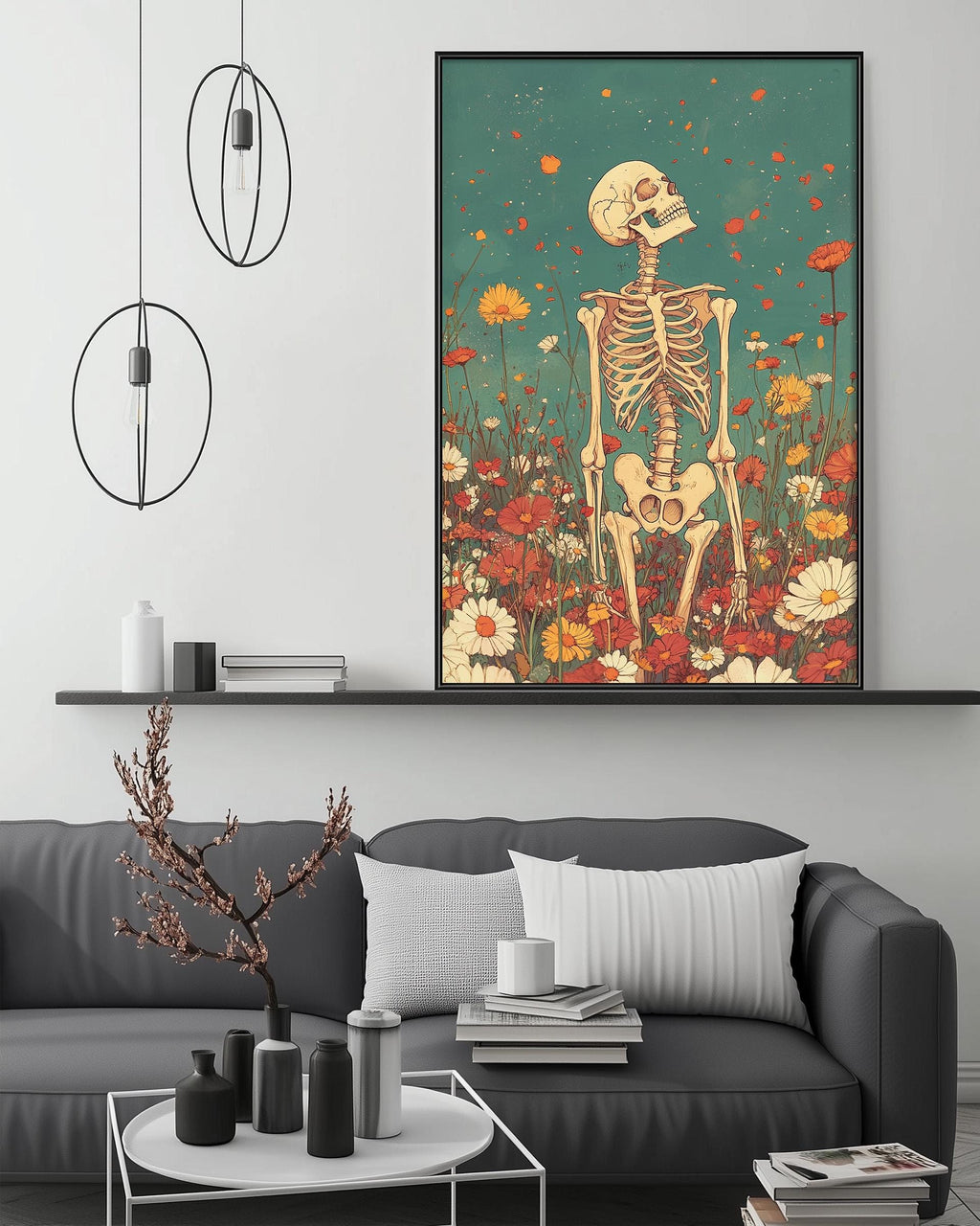 a living room with a gray sofa, a coffee table, and a large framed artwork depicting a skeleton standing in a field of flowers.