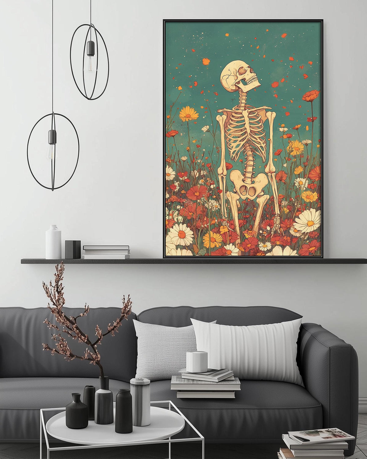 a living room with a gray sofa, a coffee table, and a large framed artwork depicting a skeleton standing in a field of flowers.