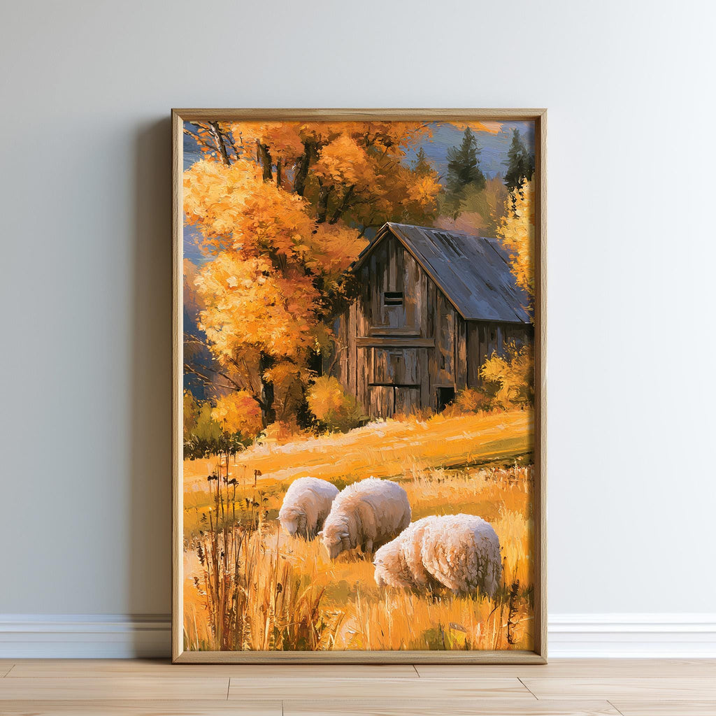 A framed painting depicting a rustic wooden barn surrounded by a field of golden grass, with sheep grazing in the foreground.