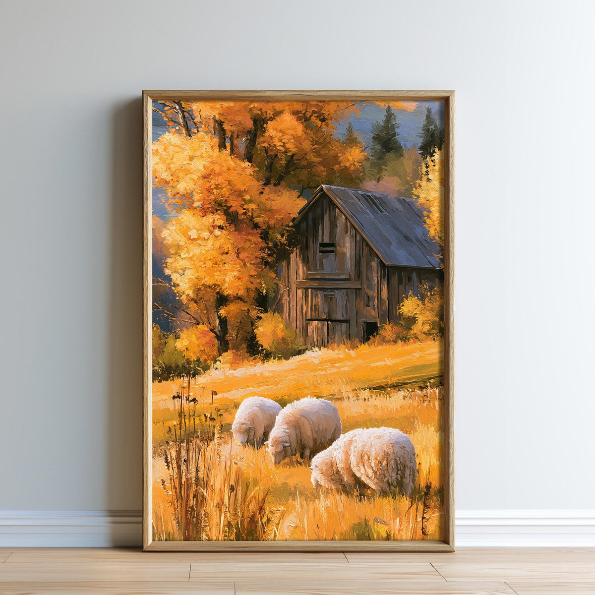 A framed painting depicting a rustic wooden barn surrounded by a field of golden grass, with sheep grazing in the foreground.