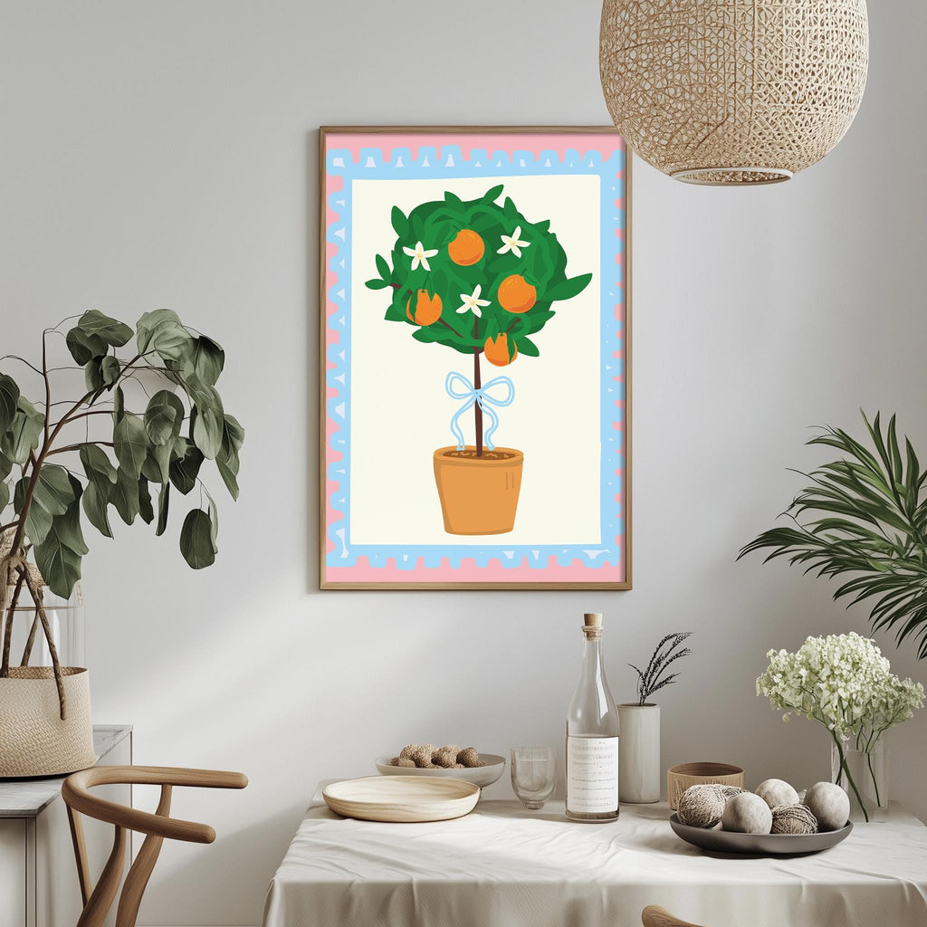 a dining table with a bowl of fruit, a bottle, and a vase of flowers, along with a potted plant and a hanging light fixture.