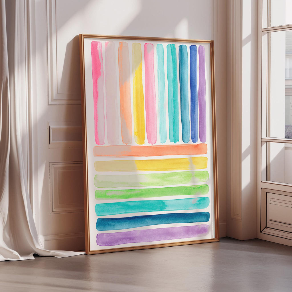 a large, colorful abstract painting with vertical lines in various colors, including pink, orange, yellow, green, blue, and purple. The painting is displayed in a gold frame and is positioned in a corner of a room with a window.