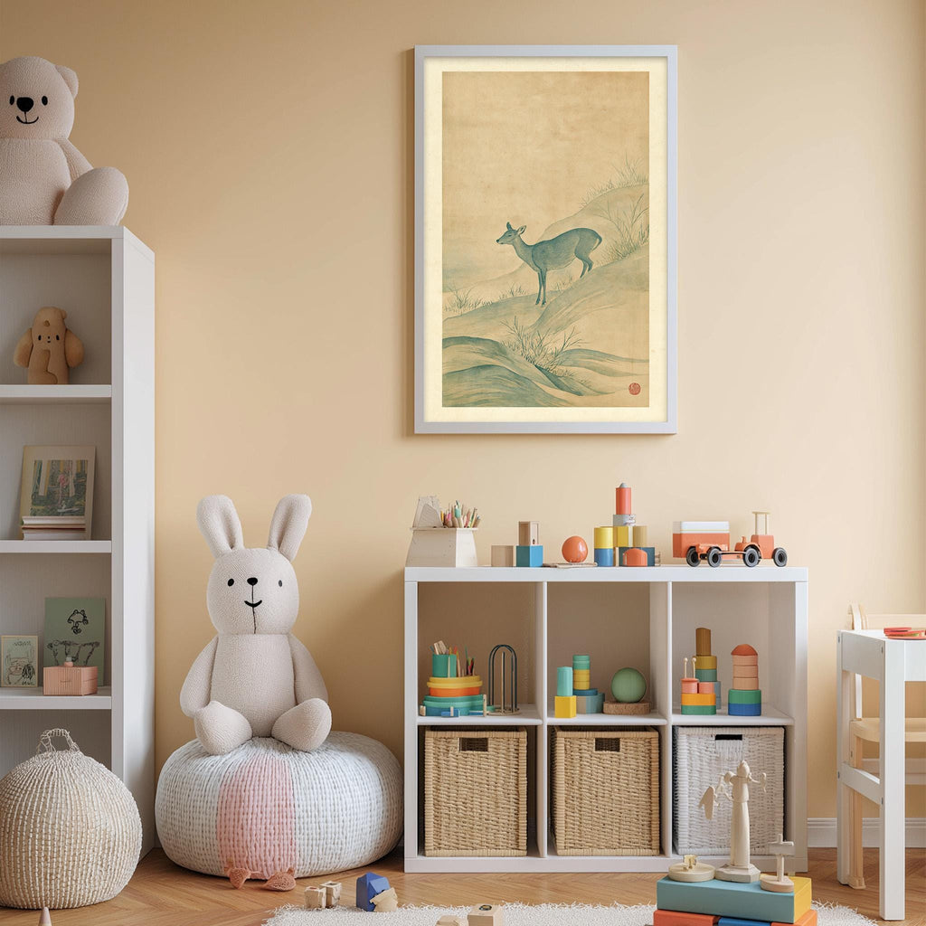 A cozy children's room with a white bookshelf, a stuffed rabbit, and a toy train set. The walls are painted a light peach color, and there is a framed picture of a deer on the wall.