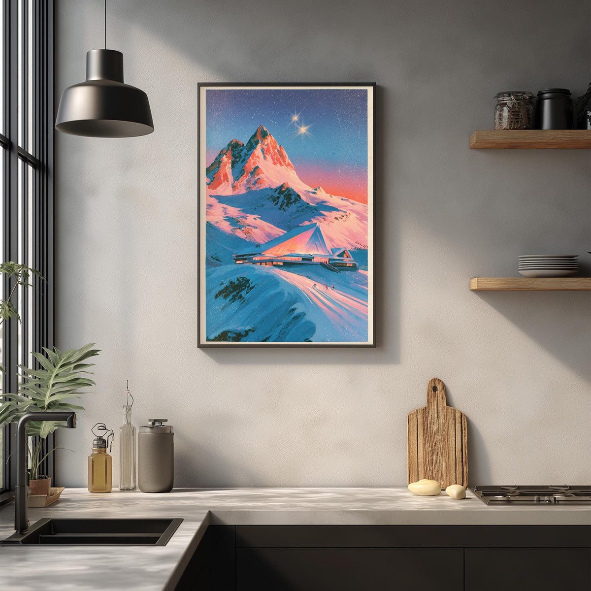 a kitchen counter with various items on it, including a framed picture of a mountain landscape, a wooden cutting board, and a potted plant.