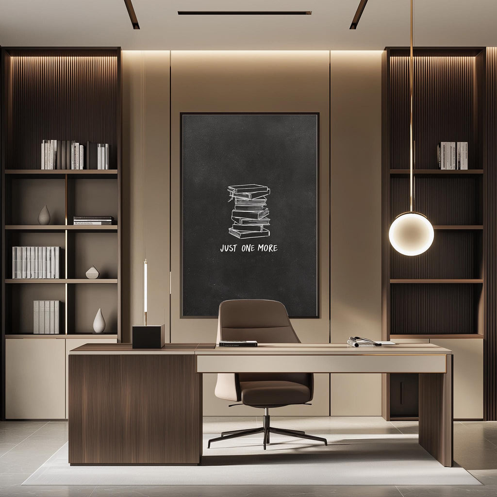 a modern and well-organized office space with a desk, chair, and bookshelves. The desk has a large blackboard with the phrase "JUST ONE MORE" written on it.