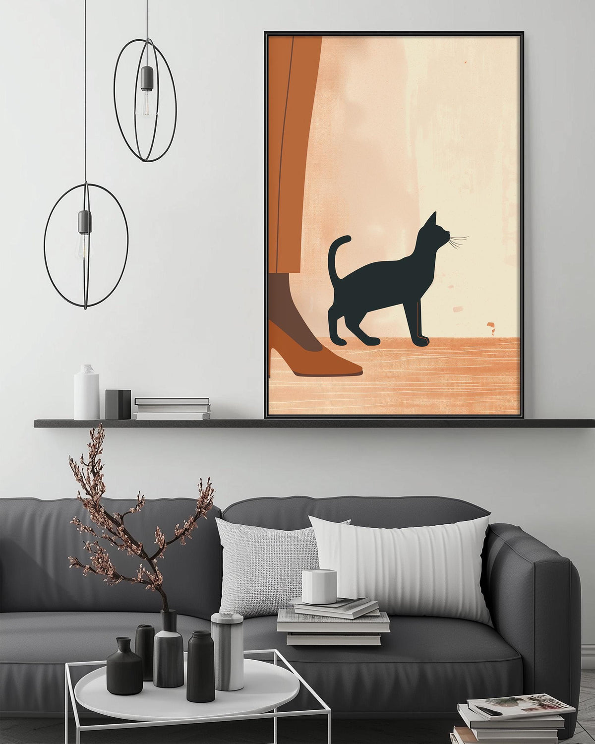 a modern living room with a gray sofa, a coffee table, and a framed artwork of a cat on the wall.