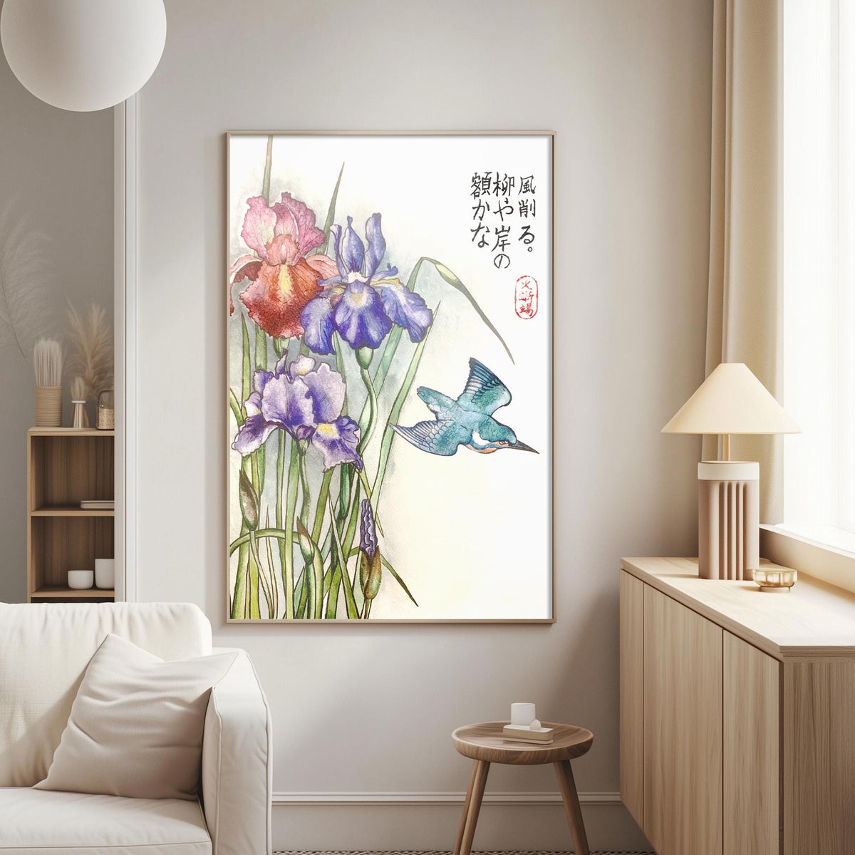 a living room with a large framed painting of colorful flowers hanging on the wall. The painting depicts a blue bird in flight next to the flowers. The room also includes a white couch, a wooden side table, and a lamp.