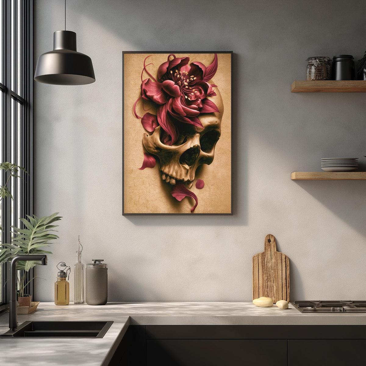 a framed artwork of a skull with a pink flower adorning its head, hanging on a wall above a kitchen counter.