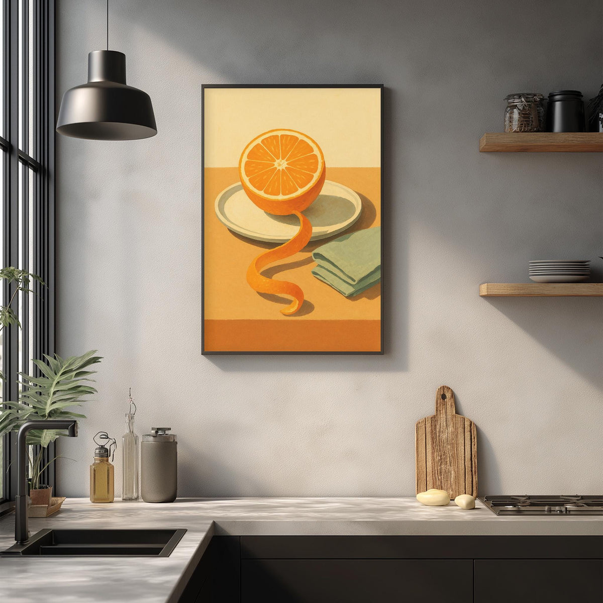 a kitchen counter with a framed painting of an orange slice hanging on the wall above it. The painting is surrounded by various kitchen items, such as a cutting board, a soap dispenser, and a bottle.