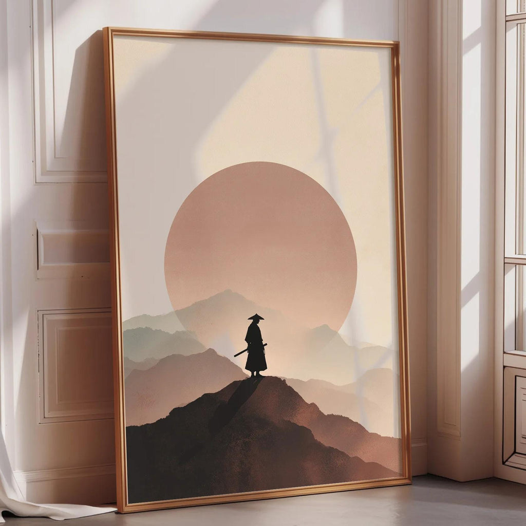 a large framed poster depicting a silhouetted figure of a person standing on a mountain peak against a backdrop of a sunset.