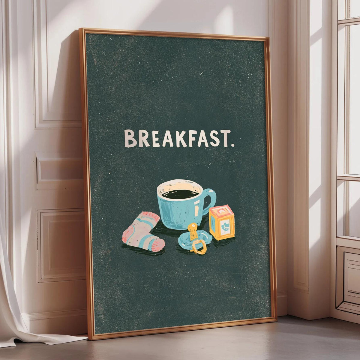 A framed poster with the word "BREAKFAST." and illustrations of a cup of coffee, a pair of socks, and a box of tea.