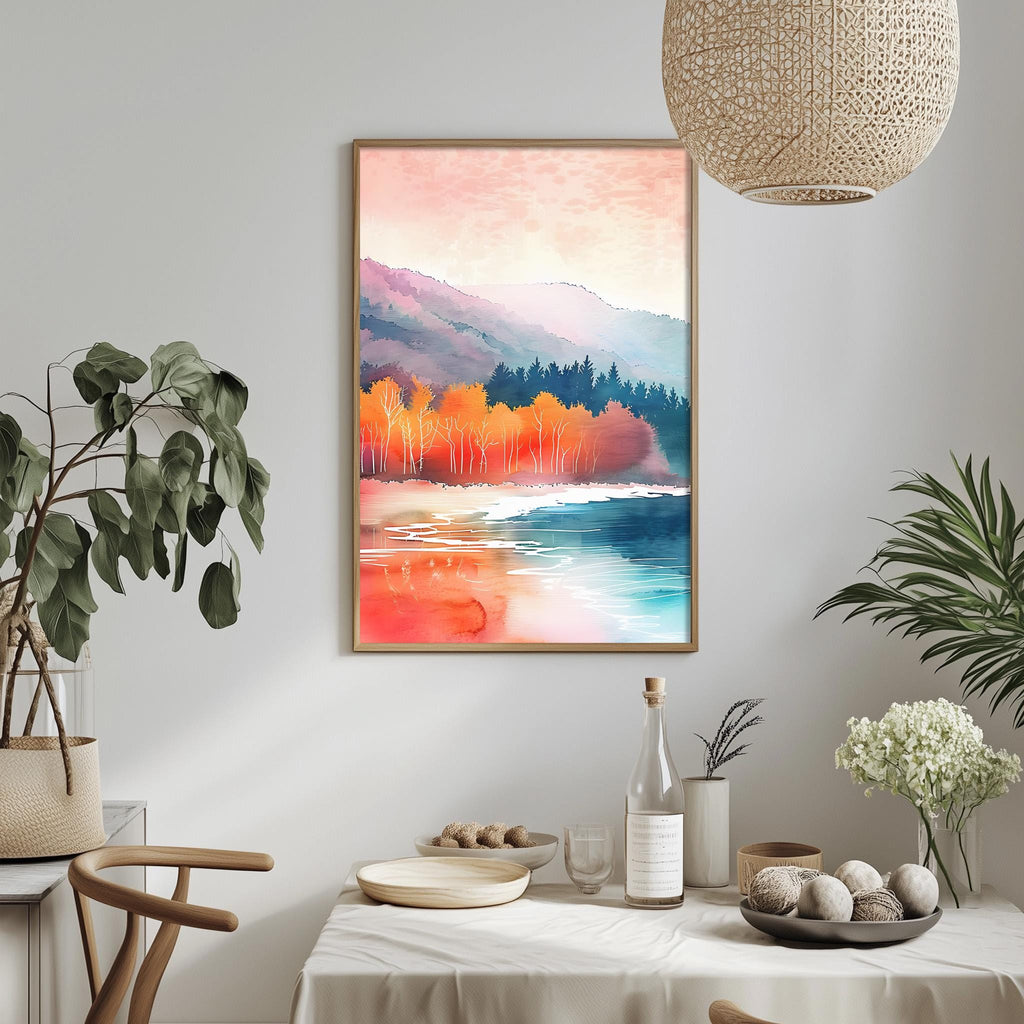 a serene landscape painting hanging on a wall, with a dining table and chairs in the foreground. The painting depicts a tranquil scene of a lake surrounded by mountains, with trees and foliage in the background. The table is set with various items, including a bottle, a bowl, and a vase, creating a cozy and inviting atmosphere.