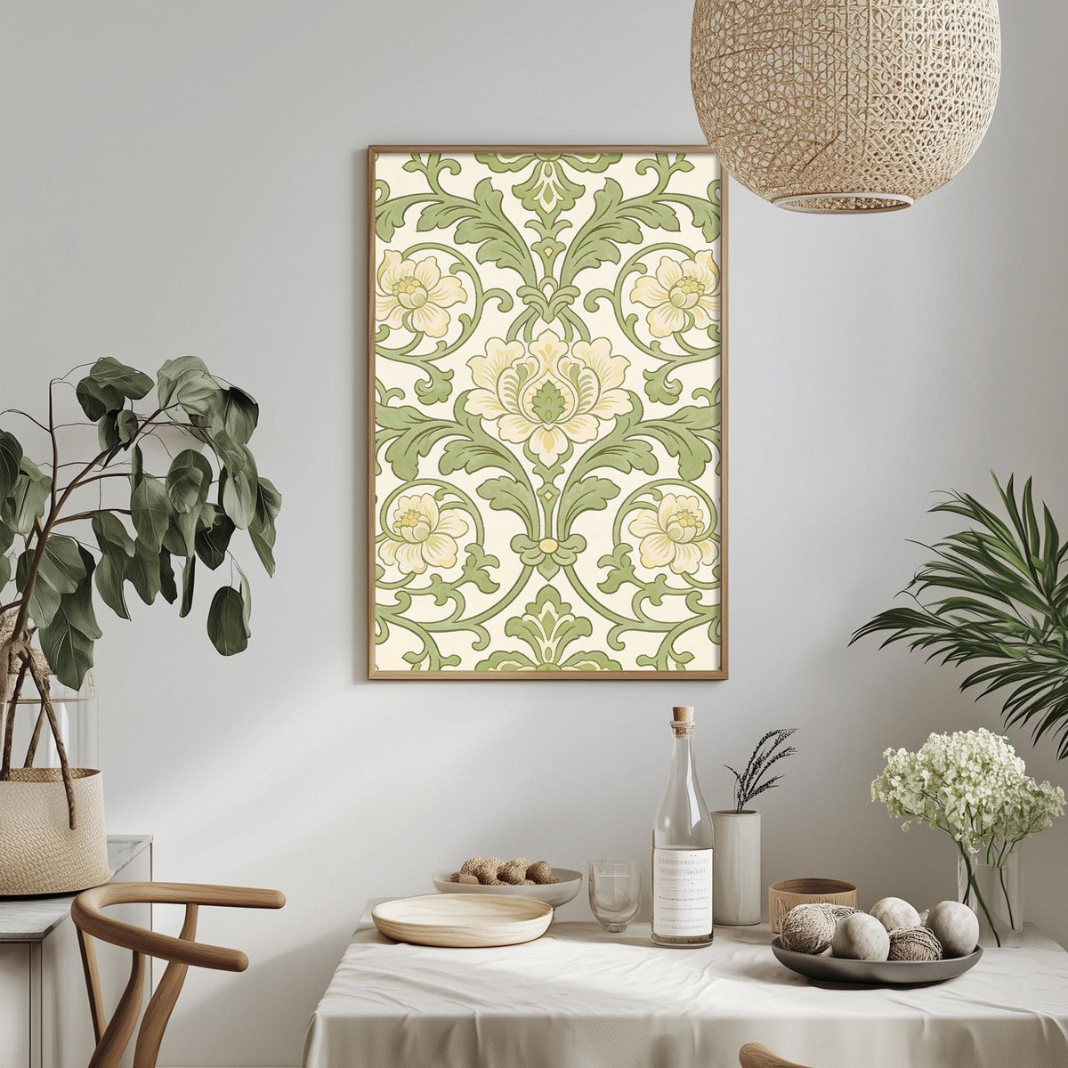 a dining room with a table set for a meal, a potted plant, a hanging lamp, and a framed floral print on the wall.