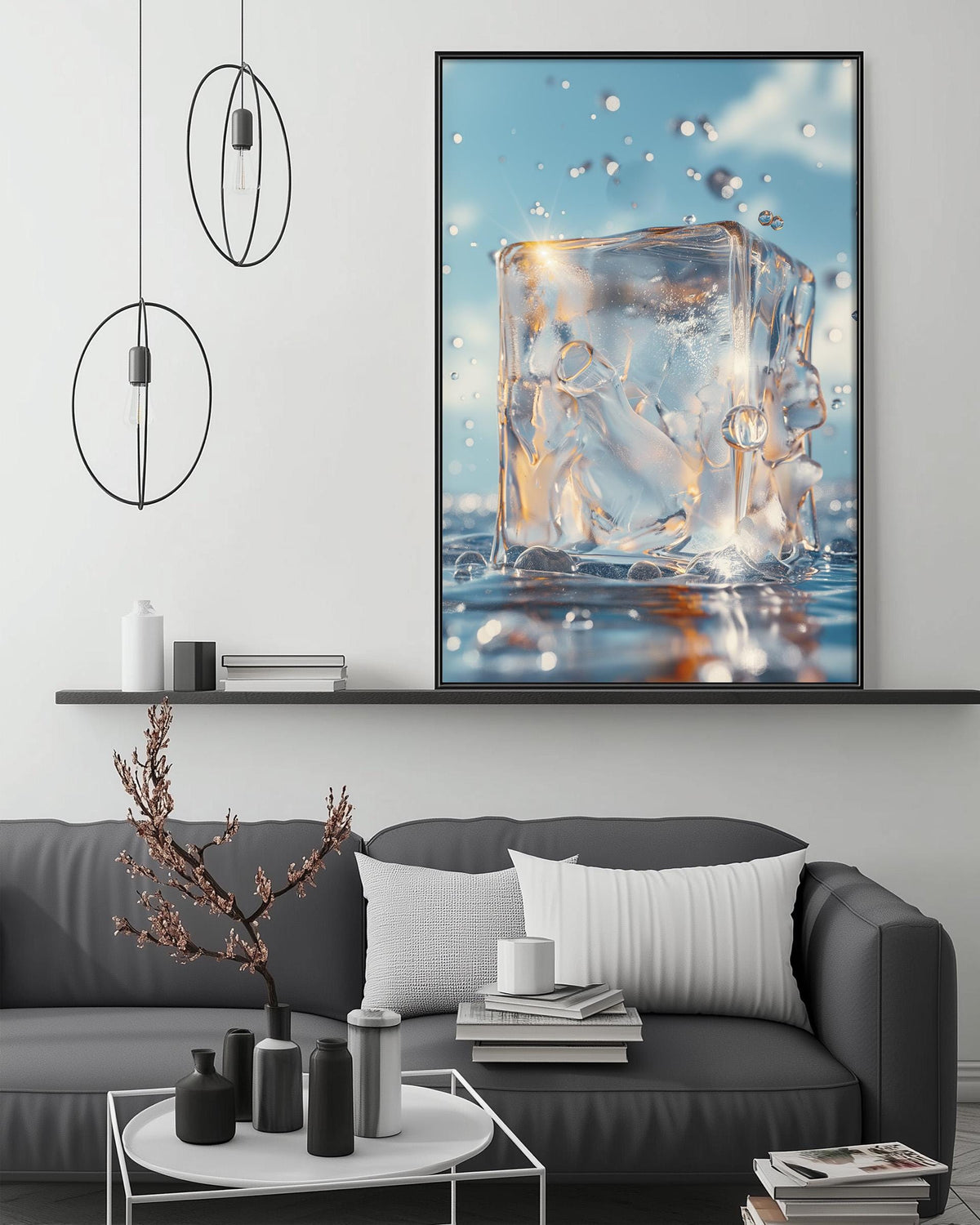 a modern living room with a gray sofa, a coffee table, and a large framed artwork depicting a water droplet on ice.